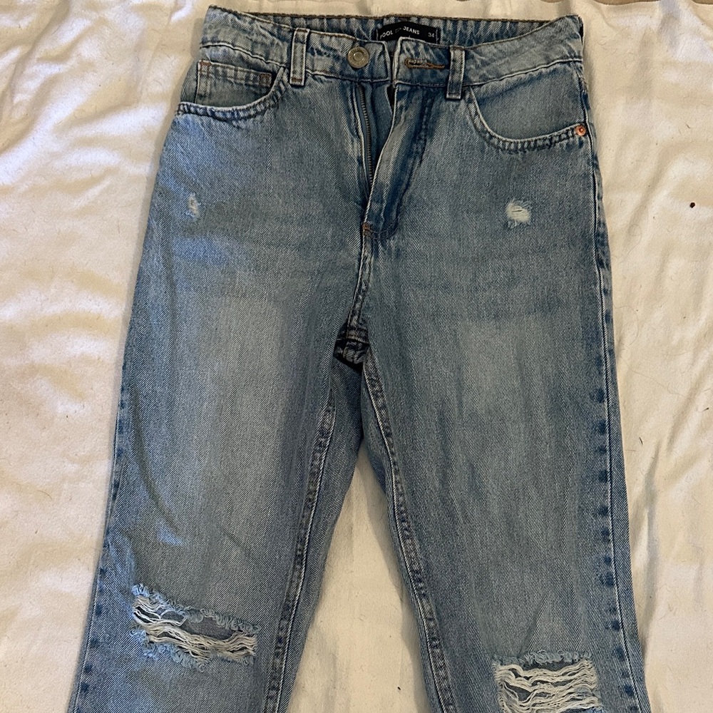 Distressed Light Blue Jeans